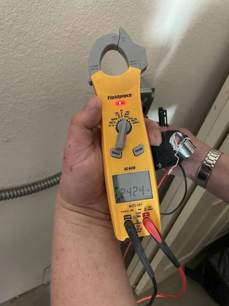 Voltage testing with clamp meter during Generator Installation in West Puente Valley